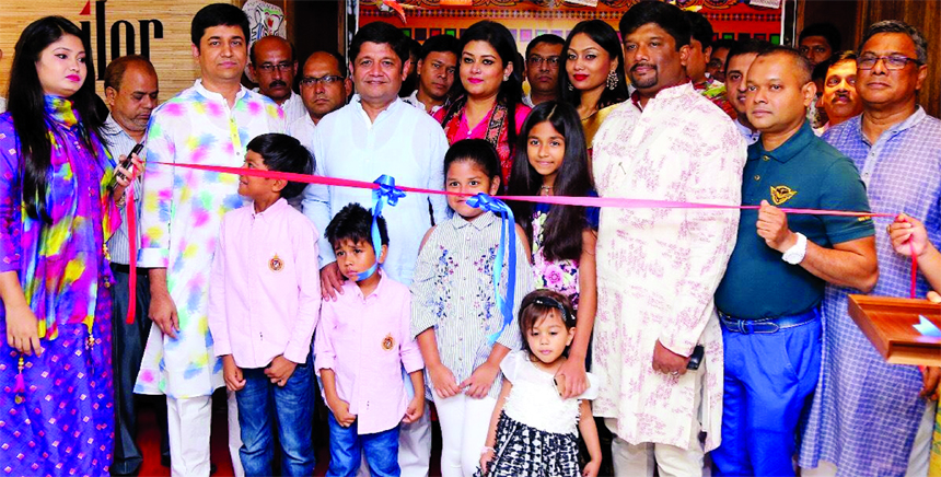 Riaz Uddin Al Mamun, Chairman of Epyllion Group, inaugurating a new showroom of famous brand 'Sailor' at Khilgaon area in the city on last Friday. Top executives of the group were present.