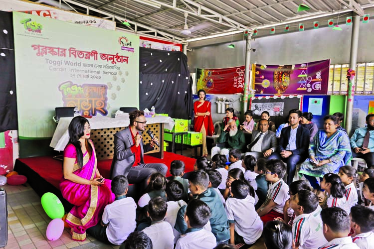 "Toggi World""of Boshundhara City Shopping Mall arranged a hand writing competition among the school students of Dhaka city and later prizes were distributed among the winners at Cardiff International School on Tuesday . Eminent physician Dr Sabrina A"