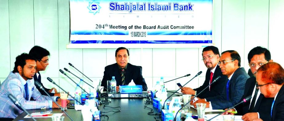 Mosharraf Hossain Chowdhury, Audit Committee Chairman of Shahjalal Islami Bank Limited, presiding over its 204th meeting at the bank head office in the city recently. Khorshed Alam Khan, Md. Moshiur Rahman Chamak, member of the committee, Farman R Chowdhu