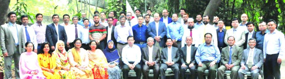 Touhidul Alam Khan, DMD and Chief Business Officer of Prime Bank Limited, poses with the participants of a training session on "Risk Management and Asset Liability Management (ALM) in Banks" arranges by Bangladesh Institute of Bank Management (BIBM) rec