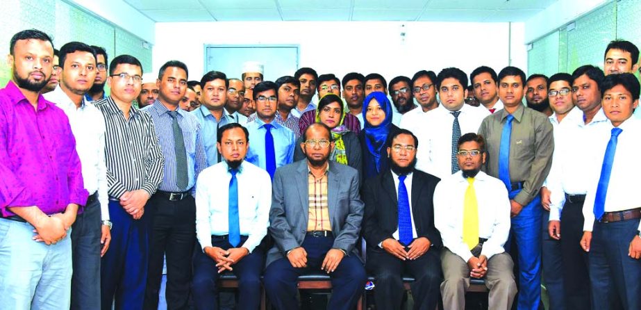 Md. Habibur Rahman, Managing Director of Al-Arafah Islami Bank Limited, poses with the participants of three days-long training course on 'Project Appraisal & Management' at the banks Training and Research Institute in the city on Tuesday. Md. Abdur Rah