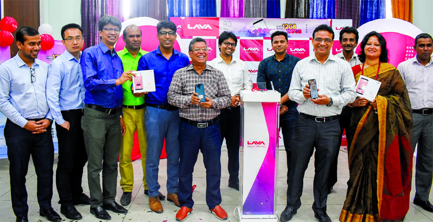 Ashraful Hasan, Managing Director of Grameen Distribution Limited, inaugurating a new handset called LAVA R3 (new 4G handset) at a launching programme at Grameen Bank Complex in the city recently. High officials of the company were also present.