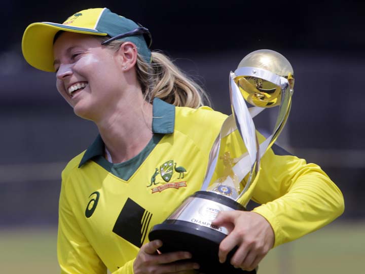 Australia's captain Meg Lanning with the trophy smiles after winning the final of Women's cricket T20 Triangular Series in Mumbai, India on Saturday.