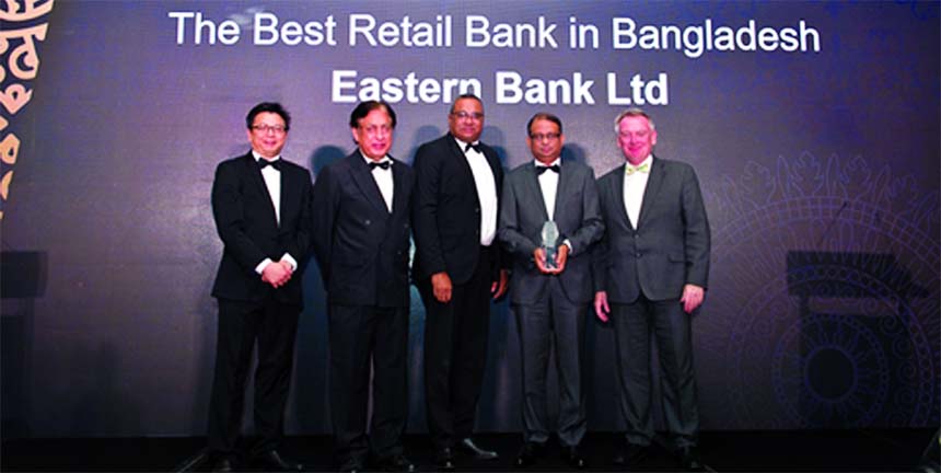 Ali Reza Iftekhar, Managing Director of Eastern Bank Limited (EBL), poses for a photograph after receiving 'The Asian Banker's International Excellence in Retail Financial Services 2018 Awards' for best retail bank in Bangladesh' at a function in Kual
