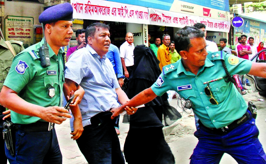Police picked up an adviser to BNP Chairperson Khaleda Zia Dr Farhad Halim Donar while distributing leaflets among the people in city's Mohakhali area on Sunday.