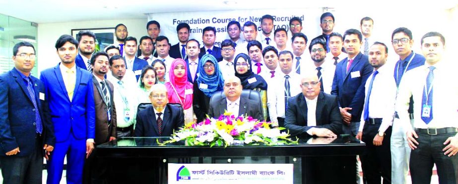 Syed Waseque Md. Ali, Managing Director of First Security Islami Bank Limited, poses with the participants of the 42nd Foundation Course for Trainee Assistant Officers at the banks Training Institute in the city on Monday. Md. Ataur Rahman, Principal and