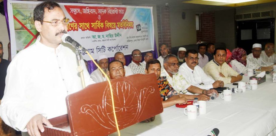 CCC Mayor A J M Nasir Uddin speaking at a discussion meeting against terrorism, militancy and drug abusers at Deen Mohammad Convention Hall as Chief Guest in Pathantoli Ward on Monday.