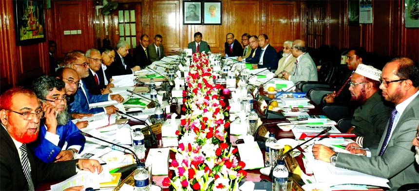 Arastoo Khan, Chairman of Islami Bank Bangladesh Limited, presiding over its Board of Directors meeting at the banks head office in the city on Thursday. Md. Mahbub ul Alam, Managing Director, Dr. Areef Suleman, representative of Islamic Development Bank,