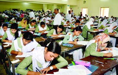 BOGURA: Students participating in the HSC examination at Bogura Government Azizul Huq College on Monday.