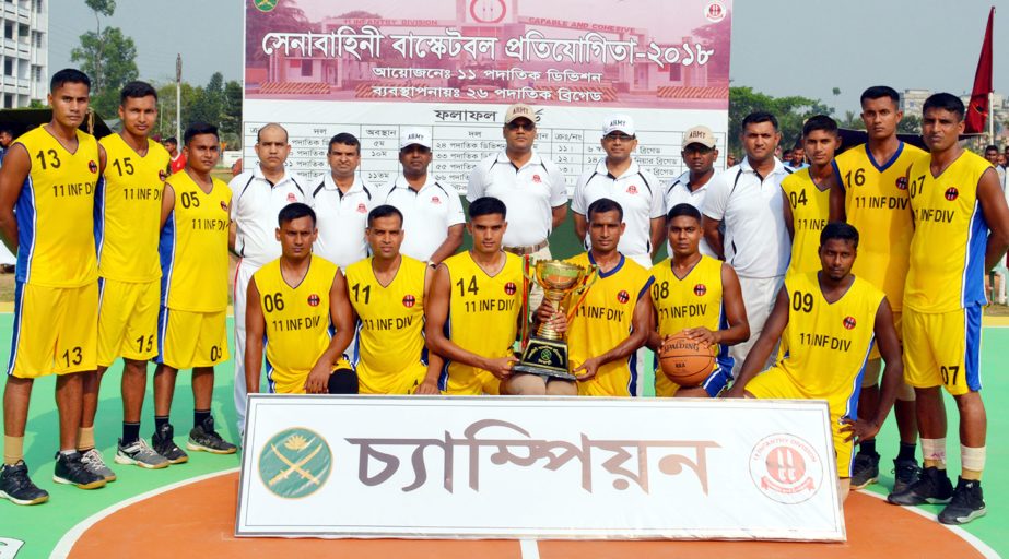 GOC of 11th Infantry Division of Bangladesh Army & Area Commander of Bagura Major General Md Moshfequr Rahman with Bagura Area team, the champions of the Bangladesh Army Basketball Competition pose for photo at the Bagura Cantonment on Monday.