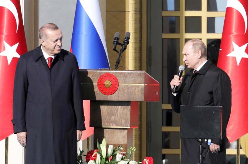 Turkish President Recep Tayyip Erdogan (L) and Russian President Vladimir Putin at a ceremony launching the construction of Turkey's first nuclear power plant as the two countries tighten their relations.