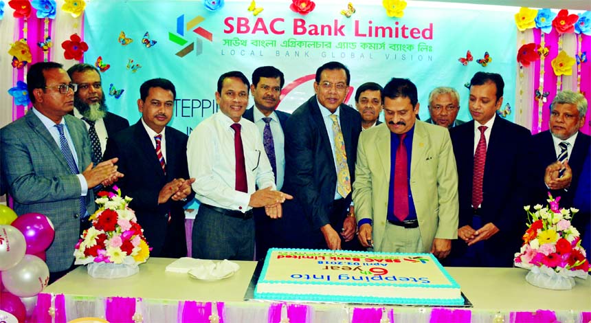 S M Amzad Hossain, Chairman of South Bangla Agriculture and Commerce (SBAC) Bank Limited, celebrating for stepping into 6th year ceremony at the bank's head office on Tuesday. Additional Managing Director Mostafa Jalal Uddin Ahmed, Training Institute's