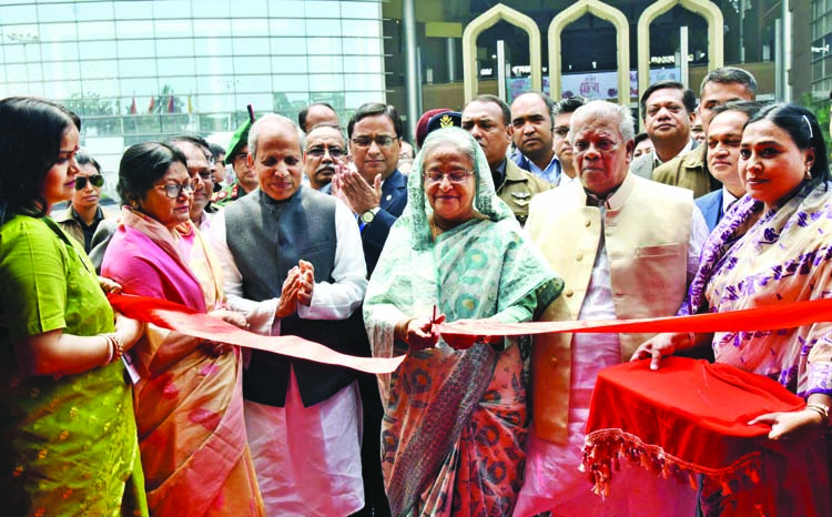 Prime Minister Sheikh Hasina inaugurating the sixth National SME Fair-2018 by cutting ribbon at the Bangabandhu International Conference Center in the city on Wednesday. BSS photo