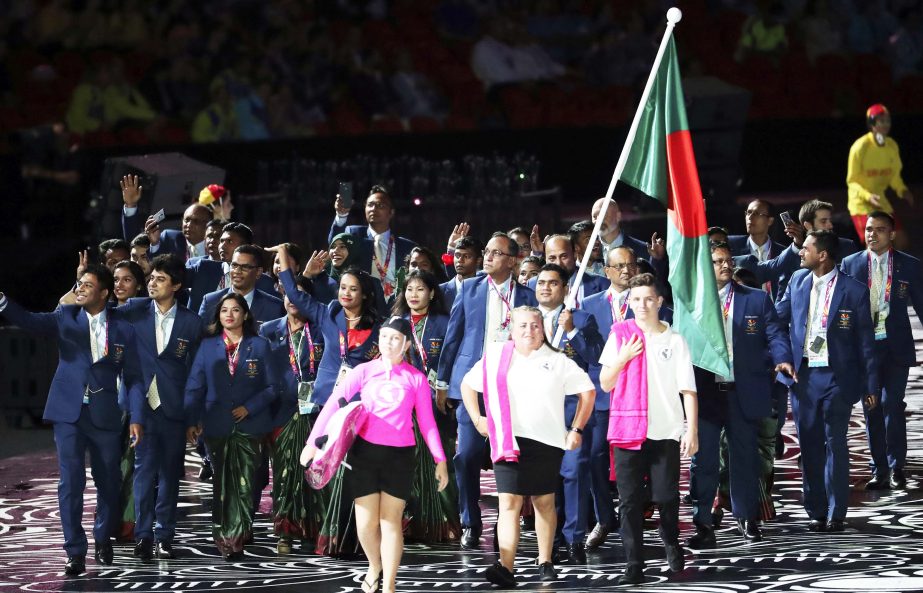 Team Bangladesh is lead by flag bearer Abdullah Hel Baki at Carrara Stadium for the opening ceremony for the 2018 Commonwealth Games on the Gold Coast, Australia on Wednesday.