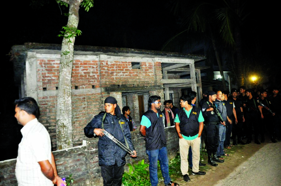 Police recovered the body of PP Rathish Chandra Bhoumik (inset) from a hole of this house. He was allegedly killed by his wife in connivance with her lover-cum colleague five days ago in Rangpur. This photo was taken on Wednesday.