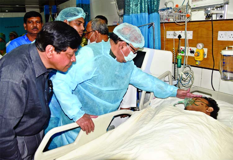 Health Minister Mohammad Nasim goes to DMCH on Thursday to see Arm lost Rajiv Hossain, student of Titumir College, gave assurance for his treatment cost to be borne by the govt and job in future.