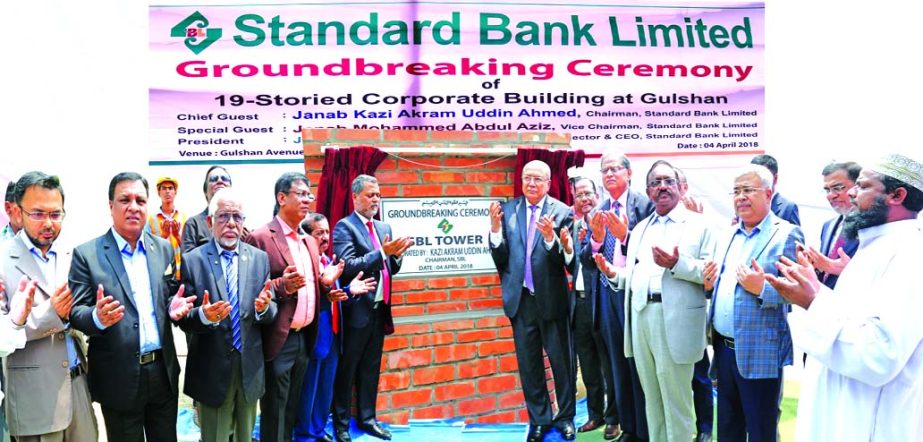 Kazi Akram Uddin Ahmed, Chairman of Standard Bank Limited, inaugurating the construction works of its Corporate Head Office Building at city's Gulshan-1 area on Wednesday. Mamun-Ur-Rashid, Managing Director, Mohammed Abdul Aziz, Vice-Chairman, Mohammed S