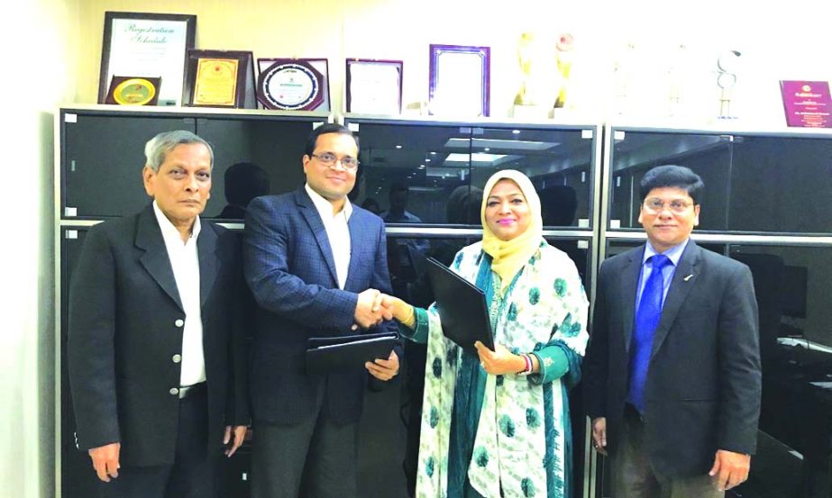 Mohammodi Khanam, CEO of Prime Insurance Company Limited (PICL) and Sunil Prakash, President of Risk Care Insurance Broking Services (Pvt) Limited (RCIBSL), India, exchanging a Re-insurance agreement signing documents at PICL head office in the city recen