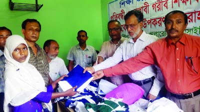 BHOLA: Bandhonn Multipurpose Cooperative Society Ltd distributed clothes among the distressed people recently.