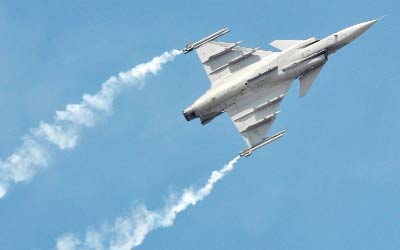 A Saab Gripen fighter jet flies during the Aero India show at Yelahanka Air Force Station in Bengaluru, India