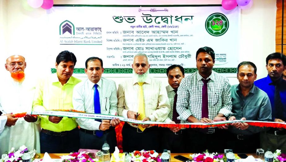 Abed Ahammad Khan, Head of Agent Banking Division of AL-Arafah Islami Bank Limited, recently inaugurating its 124th Agent Outlet at Ranir Haat in Feni. HM Zakir Khan, AVP and other senior officials of the bank were also present.