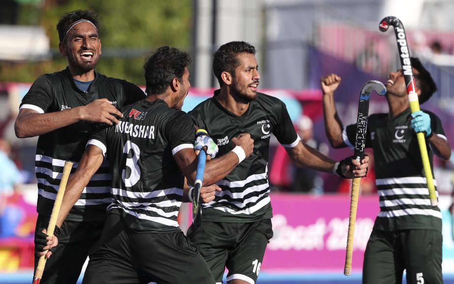 Pakistan's players, Tasawar Abbas (left) Ali Mubashar (second left) Ammad Shakeel Butt and Toseeq Arshad (right) celebrate their second goal against India during their match at the Hockey Center during the 2018 Commonwealth Games on the Gold Coast, Austr