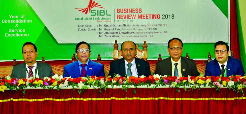 Quazi Osman Ali, Managing Director of Social Islami Bank Limited (SIBL), presiding over its 'Business Review Meeting' with all officers and executives of 13 branches of Rangpur Zone at a local hotel on Friday. Ihsanul Aziz, AMD, Abu Naser Chowdhury and