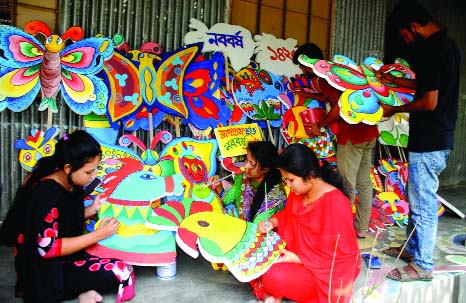 BOGURA: Students of Bogura Art College taking preparations ahead of Pahela Baishak. This picture was taken yesterday.
