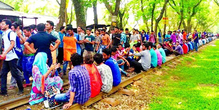 Students of Agriculture University blocked the Railway line in Mymensingh demanding that the existing quota system in public service be reformed. This photo was taken on Monday.
