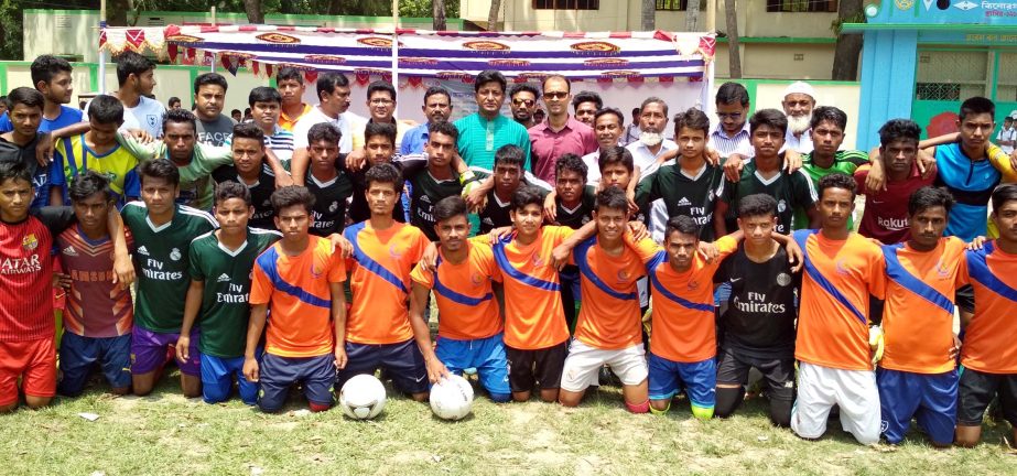 The participants of the selection programme of the Under-16 Development Cup Football Tournament of Kishoreganj District with the chief guest Md Mahmud Parvez, Mayor, Kishoreganj Municipality and the former footballers pose for photo at Azim Uddin High Sch
