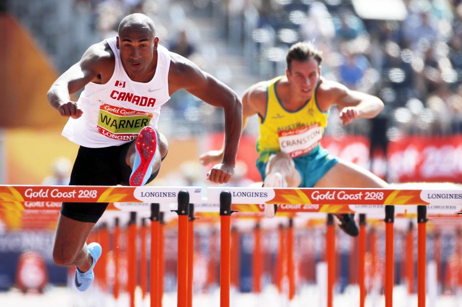 Canada's Damian Warner competes in his heat of the 110m hurdles of the decathlon at Carrara Stadium during the 2018 Commonwealth Games at the Gold Coast, Australia on Tuesday.