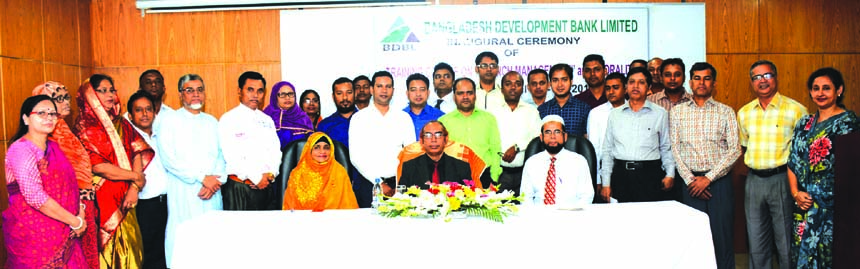 Manjur Ahmed, Managing Director of Bangladesh Development Bank Limited (BDBL), poses with the participants of a 3-day long training course on "Branch Management and Morality" at the banks Training Institute in the city on Tuesday. Mohammad Nuruddin, Hea