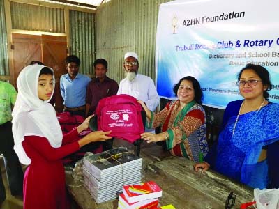 SHARIATPUR: United States Trumbull Rotary Club, AZHN Foundation and Dhaka Cosmopolitan Rotary distributed school bags, dictionary and other educational equipment among the 200 students of Naopara Public School in Shariatpur yesterday.
