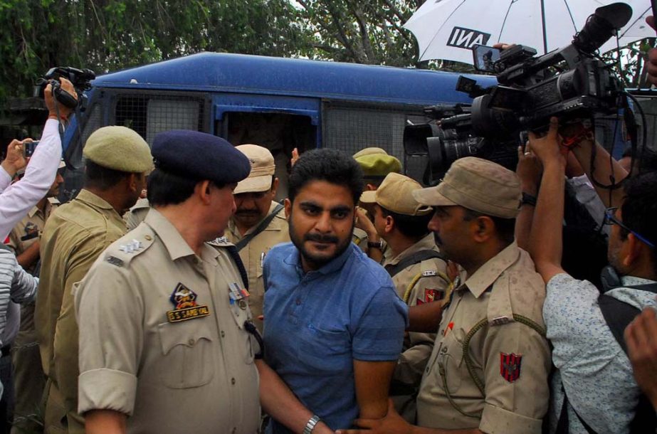 Deepak Khajuria arrives for a court appearance after he was arrested in connection with the rape and murder of an eight-year-old girl in Kathua, south of Jammu, on Monday.