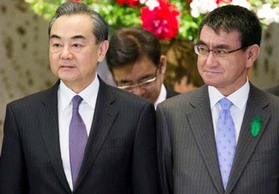 The foreign ministers of Japan and China pledge a reset in ties.