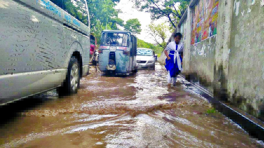 A portion of the city road goes under water due to brief rain on Tuesday for the want of proper drainage system. The snap was taken from Sher-e-Bangla Nagar area.