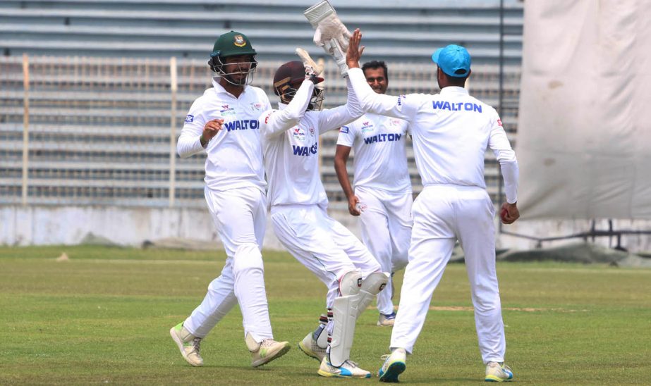 Players of Walton Central Zone celebrating after dismissal of Tushar Imran of Prime Bank South Zone during their first day match of the Bangladesh Cricket League (BCL) at the Shaheed Kamruzzaman Stadium in Rajshahi on Tuesday.
