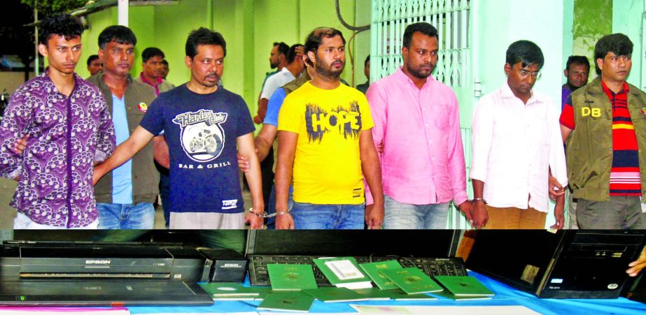 Four members of fake visa-making gang were arrested by DB Police with some equipment from city's Uttara area. This photo was taken from in front of DB office on Tuesday.