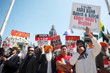 Demonstrators stage a protest against the visit by India's Prime Minister Narendra Modi in Parliament Square, London, Britain.
