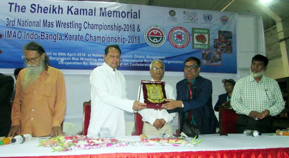 Minister for Information Hasanul Haq Inu, MP, speaking at the inaugural ceremony of the Sheikh Kamal Memorial 3rd National Mas-Wrestling Championship as the chief guest at the National Sports Council on Thursday.