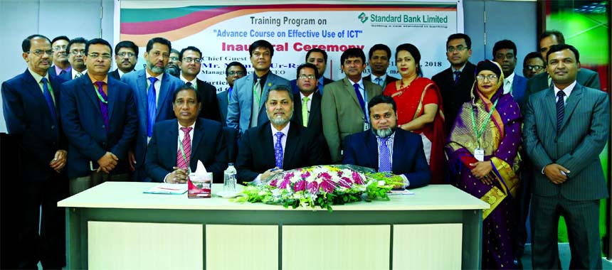 Mamun-Ur-Rashid, Managing Director of Standard Bank Limited, poses with the participants of a four-day long training on "Advance Course on Effective Use of ICT" for its head office executives at the banks Training Institute in the city recently. Hossain