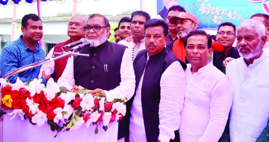 SUJANAGAR (Pabna) : Liberation Affairs Minister AKM Mozammel Haq addressing a public meeting at Shaheed Dulal Pilot Girls' High School ground as Chief Guest after inaugurating Freedom Fighters' Complex yesterday.