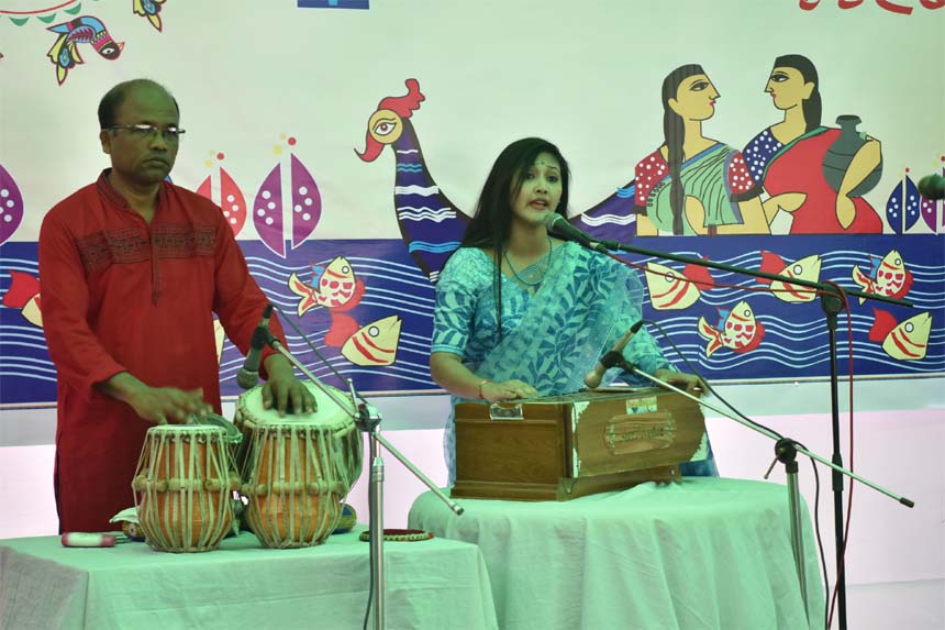 Promising singer Shraban Sharma Biswas rendering songs at the cultural programme organised by the National Press Club on the occasion of â€˜Pahela Baishakh,â€™ the first day of Bengali New Year 1425.