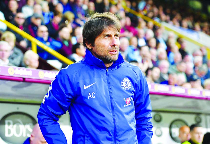 Chelsea manager Antonio Conte looks on at the beginning of play against Burnley, during the English Premier League soccer match at Turf Moor, Burnley, England on Thursday.