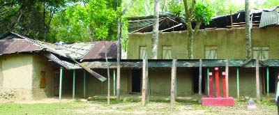 BHALUKA (Mymensingh): Bhoraduba Gilrs' High School needs immediate repair which has been damaged by recent nor'wester . This snap was taken yesterday.