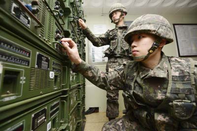 South Korean army soldiers adjust equipment used for propaganda broadcasts near the border area between South Korea and North Korea in Yeoncheon, South Korea.