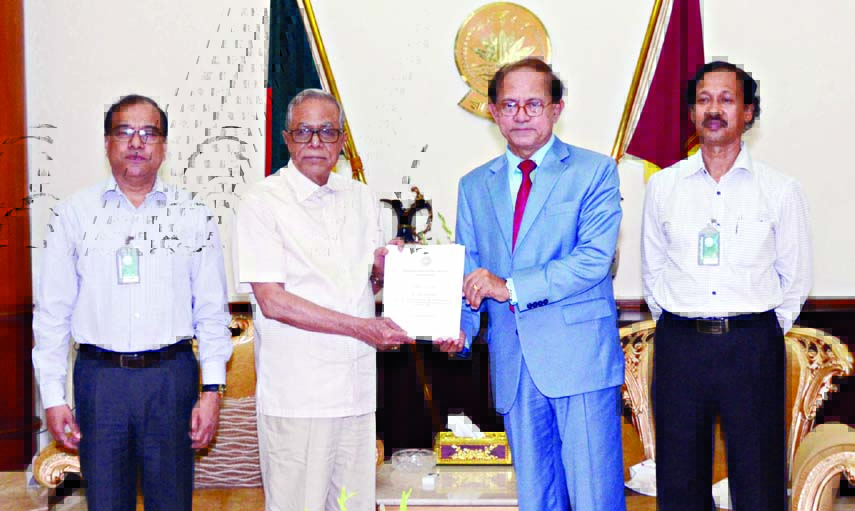 President Abdul Hamid receiving an annual audit report from a delegation led by Auditor and Comptroller General Masud Ahmed at Bangabhaban on Monday. Press Wing, Bangabhaban photo