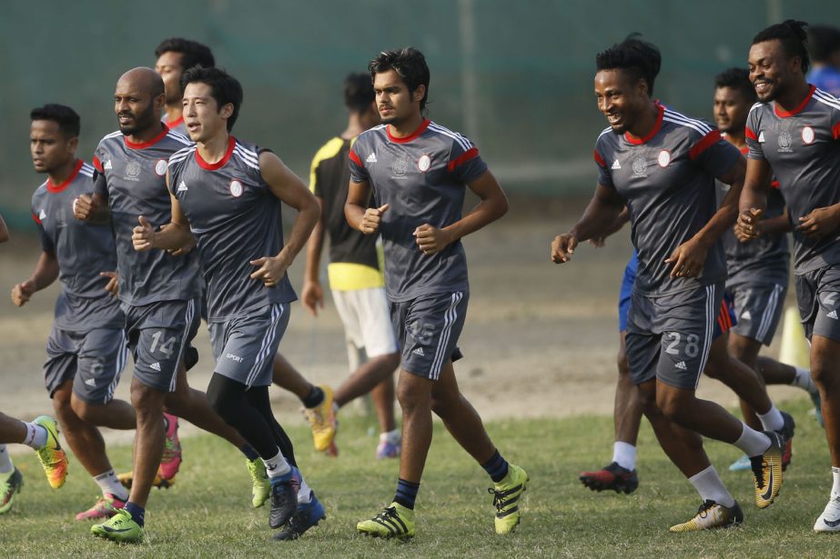 Members of Dhaka Abahani Limited during their practice session at the Abahani Ground on Tuesday.