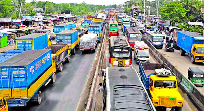 Hundreds of vehicles in a huge traffic gridlock got stuck on Cumilla-Daudkandi Highway on Wednesday, causing immense sufferings to commuters due to traffic mismanagement and road repair work.