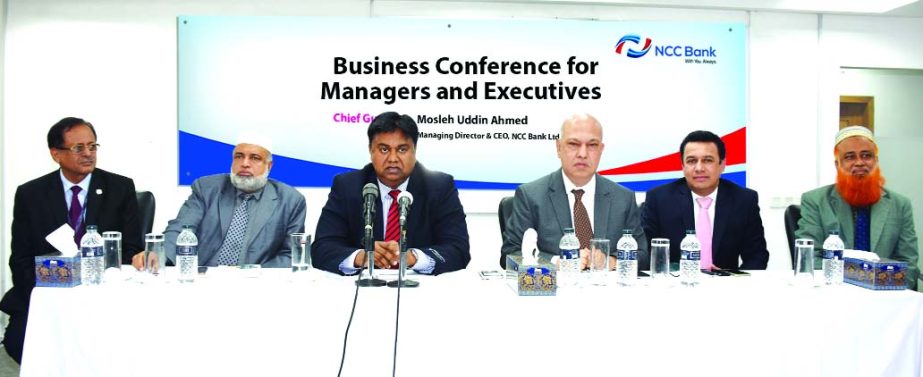 Mosleh Uddin Ahmed, Managing Director of NCC Bank Limited, presiding over a day long "Periodical Business Conference for Managers and Executives" at the bank's head office in the city recently. Khondoker Nayeemul Kabir, AZM Saleh, Md. Habibur Rahman, D